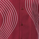 Close-up of ruby walking suit shirt showing the detailed tonal multi-row puff stitched curved lines.