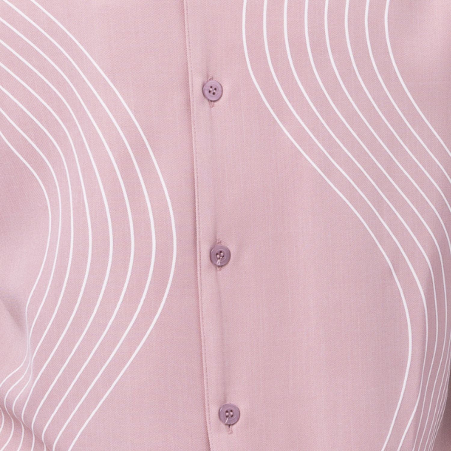Close-up of blush pink walking suit shirt showing the detailed tonal multi-row puff stitched curved lines.