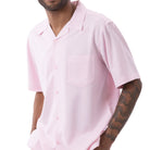 Front view of the pink solid short sleeve men's walking suit shirt.