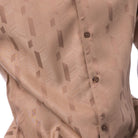 Close-up of the mocha walking shirt showing the subtle vertical textured pattern and premium fabric quality.
