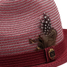 Close-up profile of the Jazzique Collection cranberry fedora showing the 2-inch stingy brim and braided texture.