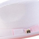 Close-up side profile of the Dazzluxe Collection white and pink fedora showing the wide brim and pinch crown.