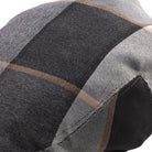 grey checkered flat cap pattern close up