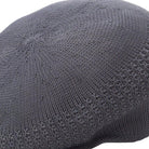 close up knitted texture grey cap