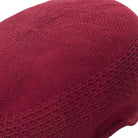 close up knitted texture red cap