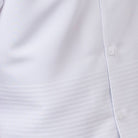 Close-up of the white tone-on-tone horizontal stripe texture on the refined polyester walking suit.