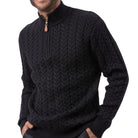 close up of black quarter zip cable knit sweater texture
