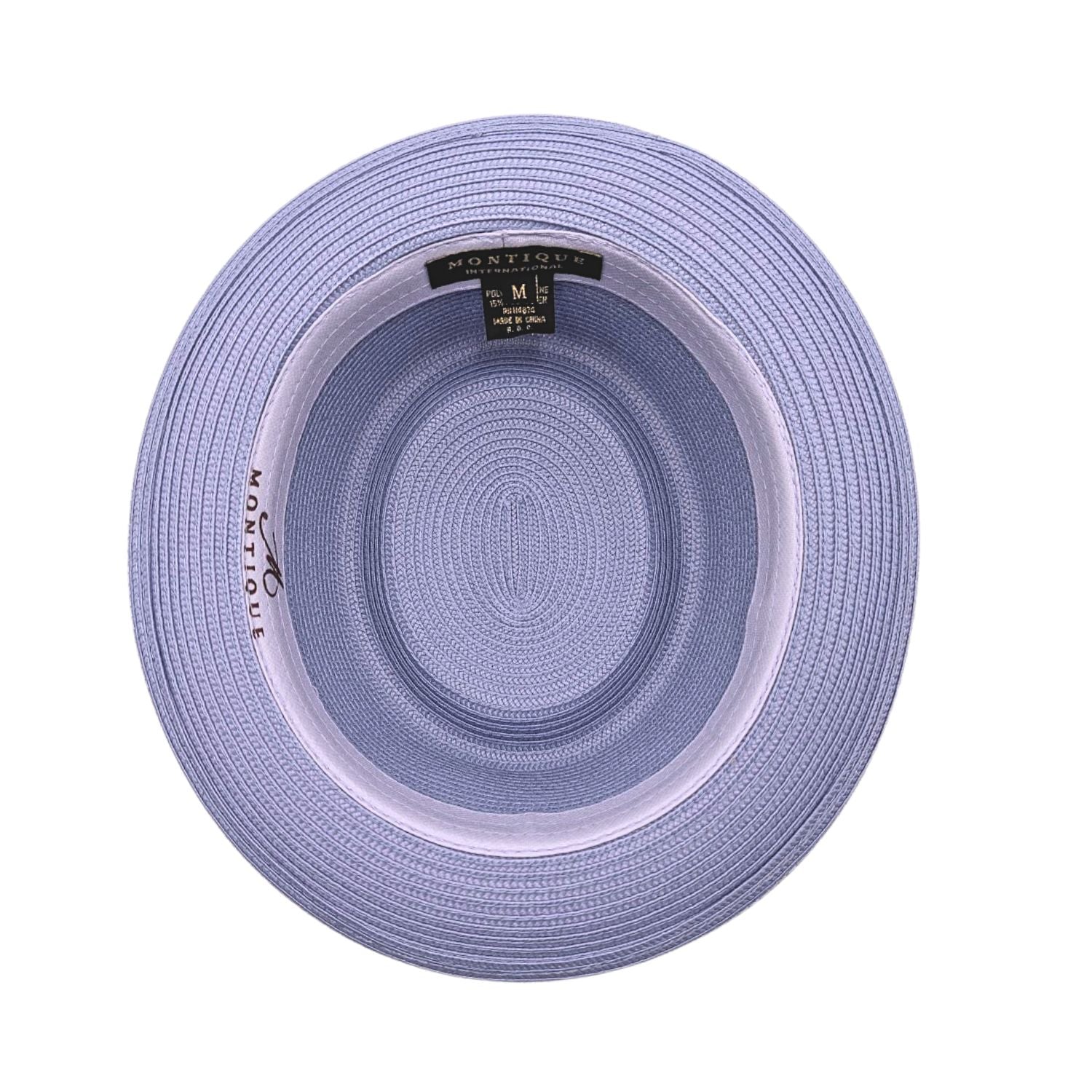 Lilac Montique pork pie hat interior view showing woven construction, flat crown, inside sweatband, and Montique label