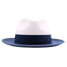 Navy and white Montique fedora hat front view with white woven crown, navy band, and matching navy brim