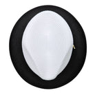 Black and white Montique fedora hat top view showing white woven crown, black wide brim, and gold side pin detail