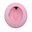 Pink Montique fedora hat interior view with braided crown, matching brim, and branded inner label