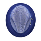 Royal blue Montique fedora hat top view with blue and white woven crown, solid blue brim, and side logo pin detail