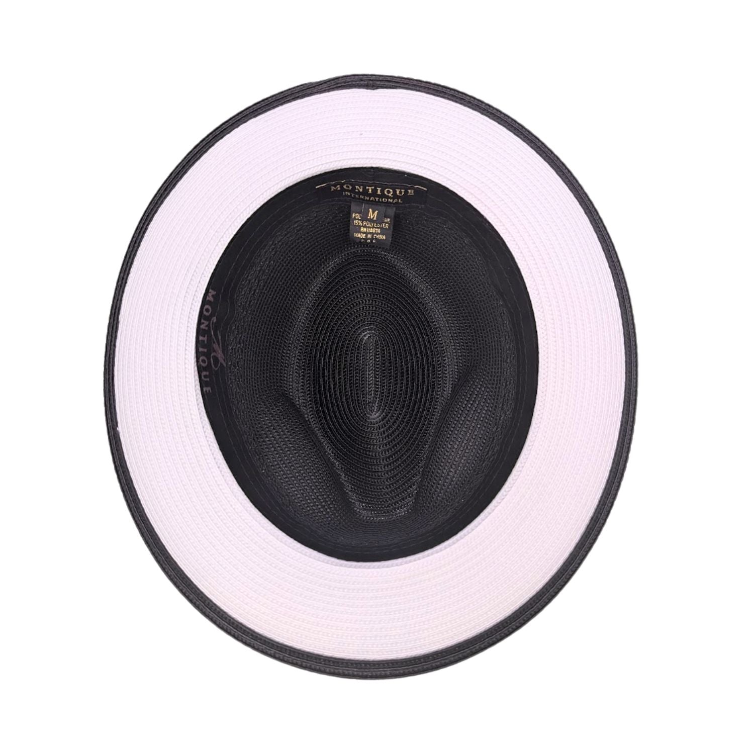 Black and white Montique fedora hat interior view with black crown, white brim underside, black edge trim, and branded sweatband