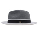 White fedora hat side view with black band, white accent stripe, black and white woven crown, and Montique logo pin