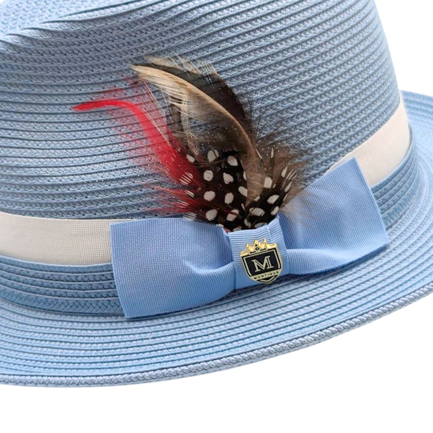 Montique Carolina blue fedora hat close-up showing woven crown texture, feather accent, light blue bow, and white ribbon band