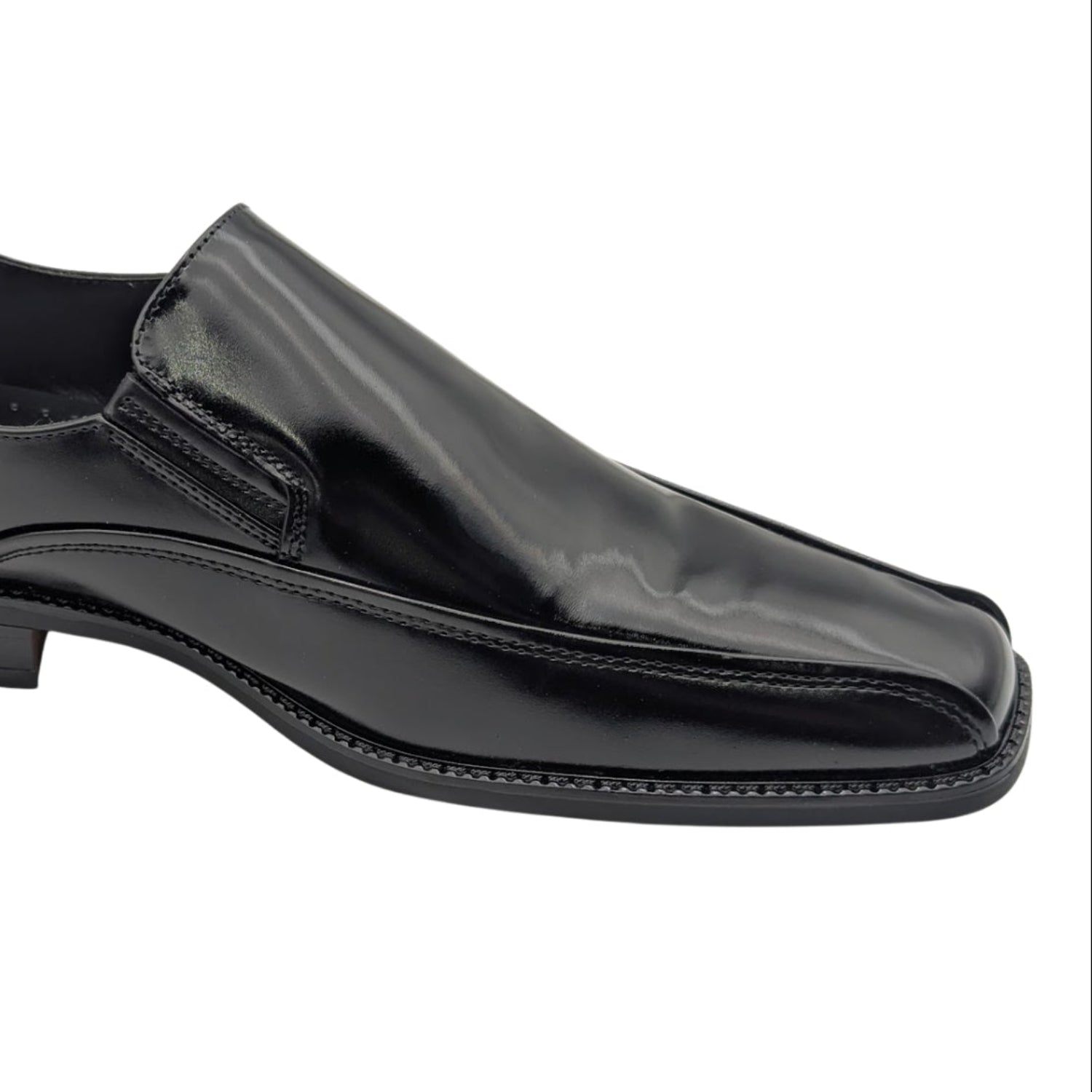 black polished slip-on dress shoe side view close up