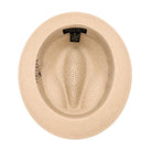 Beige Montique fedora hat interior view with open weave crown, white sweatband, and branded label