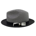 Montique black straw fedora hat side view with black brim, black ribbon band, white bow accent, and logo pin