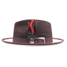 Brown and white fedora hat side view with open weave brown crown, white brim, brown band, feather accent, and Montique pin