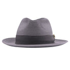 grey Montique fedora hat front view with matching ribbon band, wide brim, and gold side pin