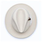White Lightfelt 2 1/2 inch wide brim wool felt pinch crown fedora hat by Montique top view with feather accent