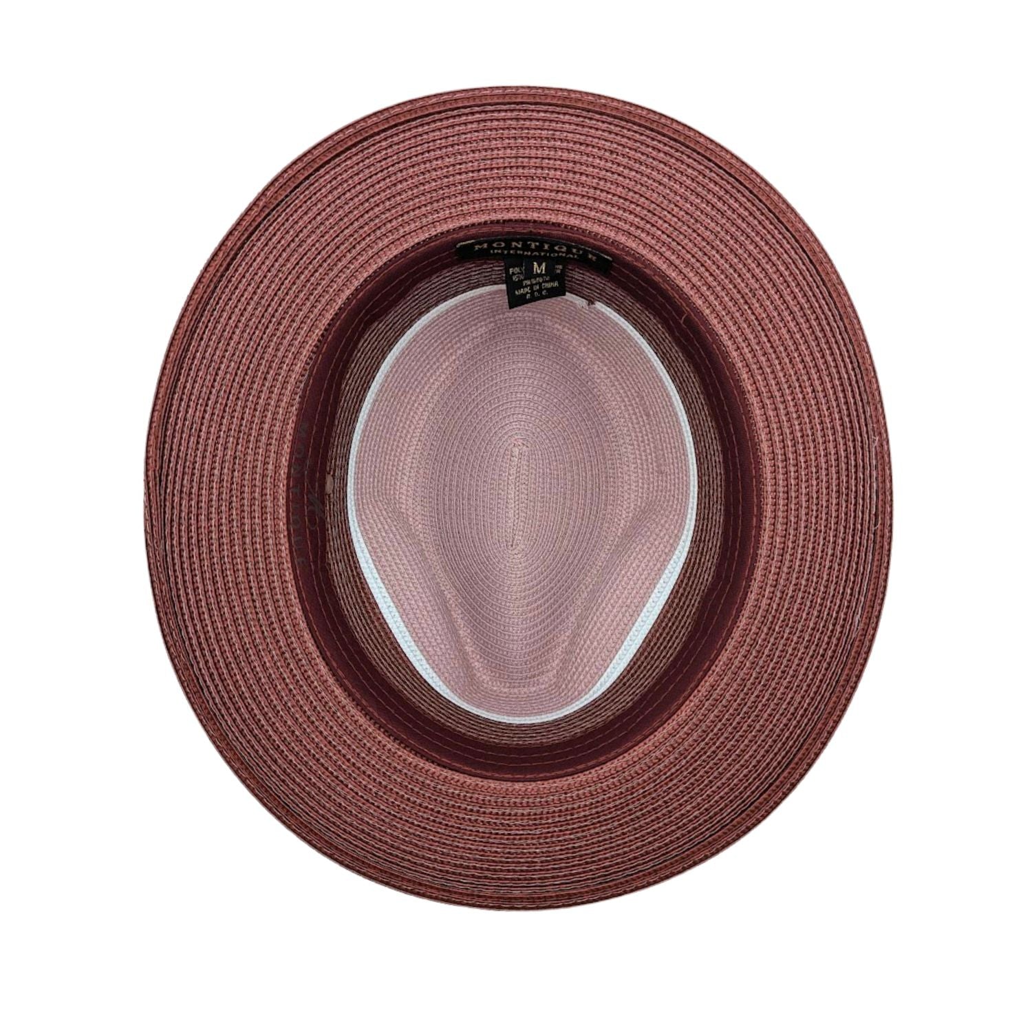 Blush and burgundy Montique fedora hat interior view with woven straw texture, contrast brim, and inside label