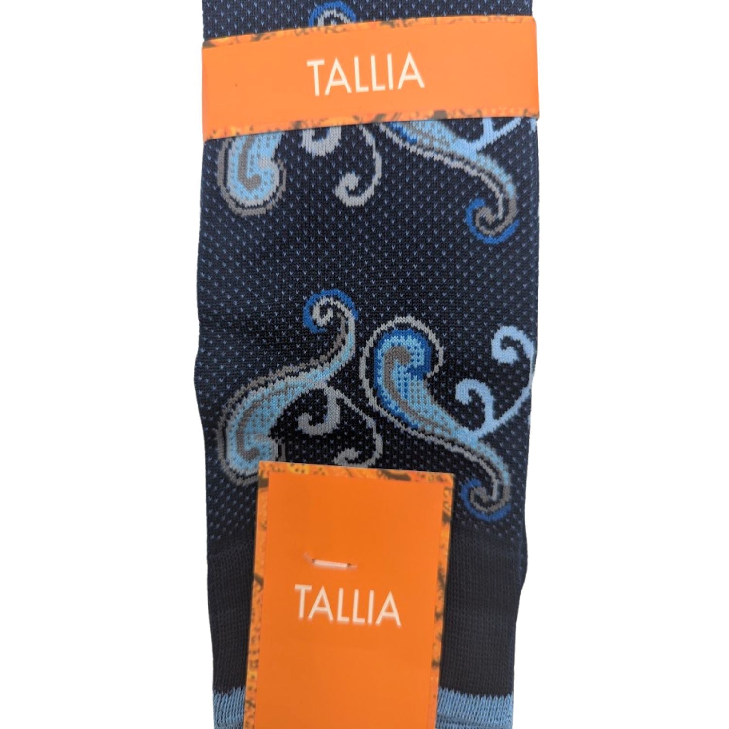 close up of navy blue paisley scroll dress sock pattern