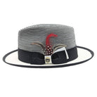 black and white straw fedora hat side view with feather accent and logo pin