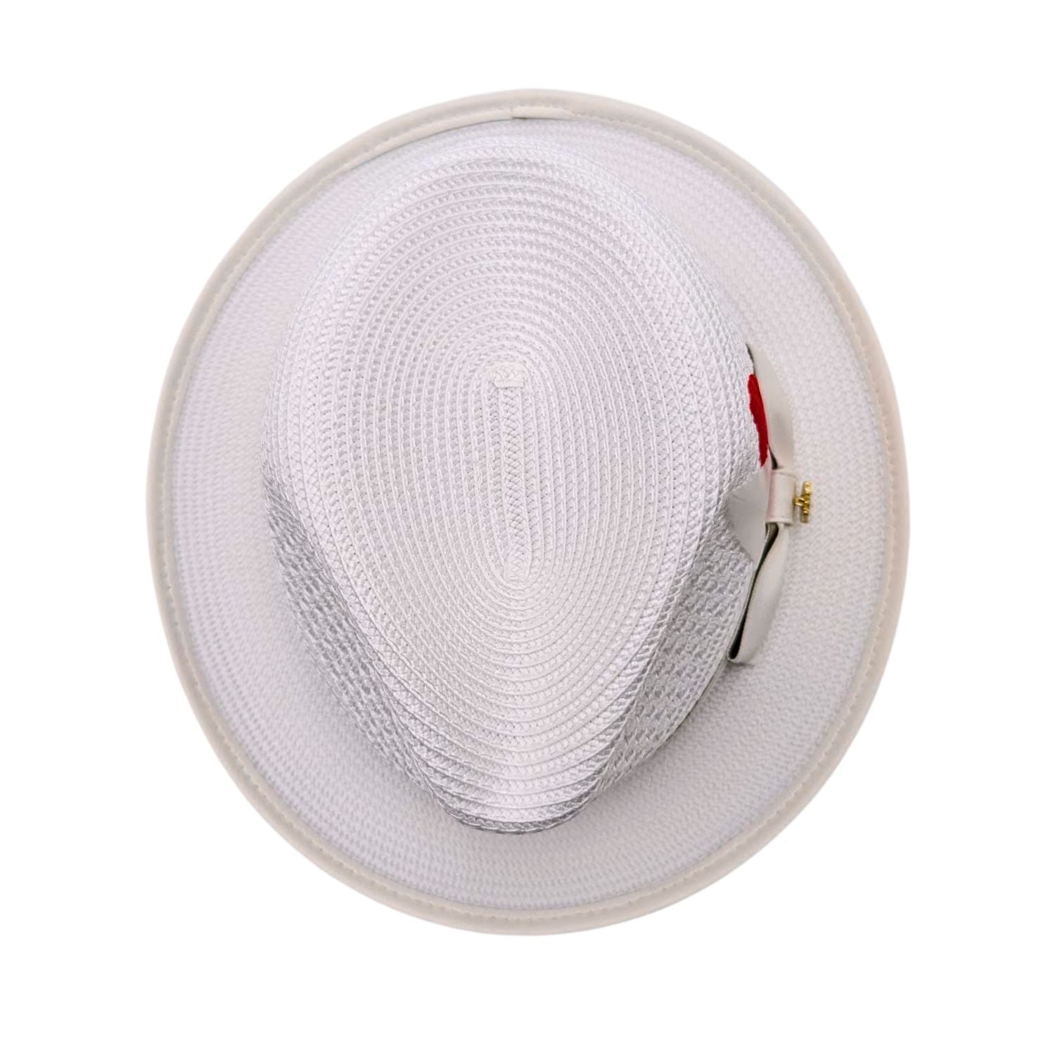 White Montique fedora hat top view showing pinched crown, woven texture, white brim, and side feather detail