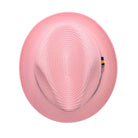 Montique pink straw fedora hat top view with woven crown, wide brim, and multicolor side ribbon detail