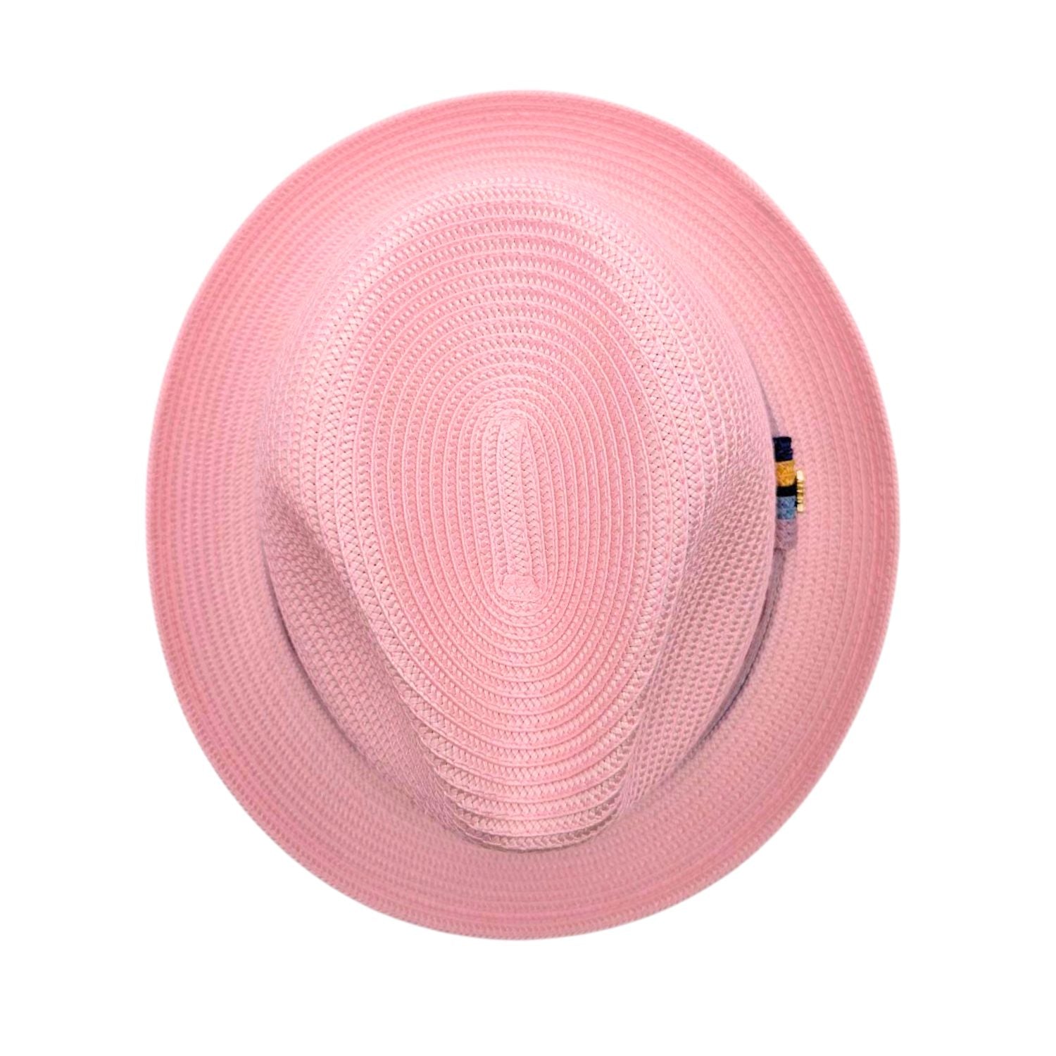 Montique pink straw fedora hat top view with woven crown, wide brim, and multicolor side ribbon detail