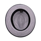 Inside view of black and white striped men’s fedora hat showing woven pattern, black sweatband, and Montique label