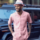 Pink tonal vertical textured men's short sleeve walking shirt with a relaxed camp collar.