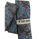 Close-up of the layered chocolate and blue paisley pattern from the Crimson Cipher Collection.