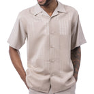 Front profile of the beige short sleeve button-up shirt showing the regular fit and straight hem.