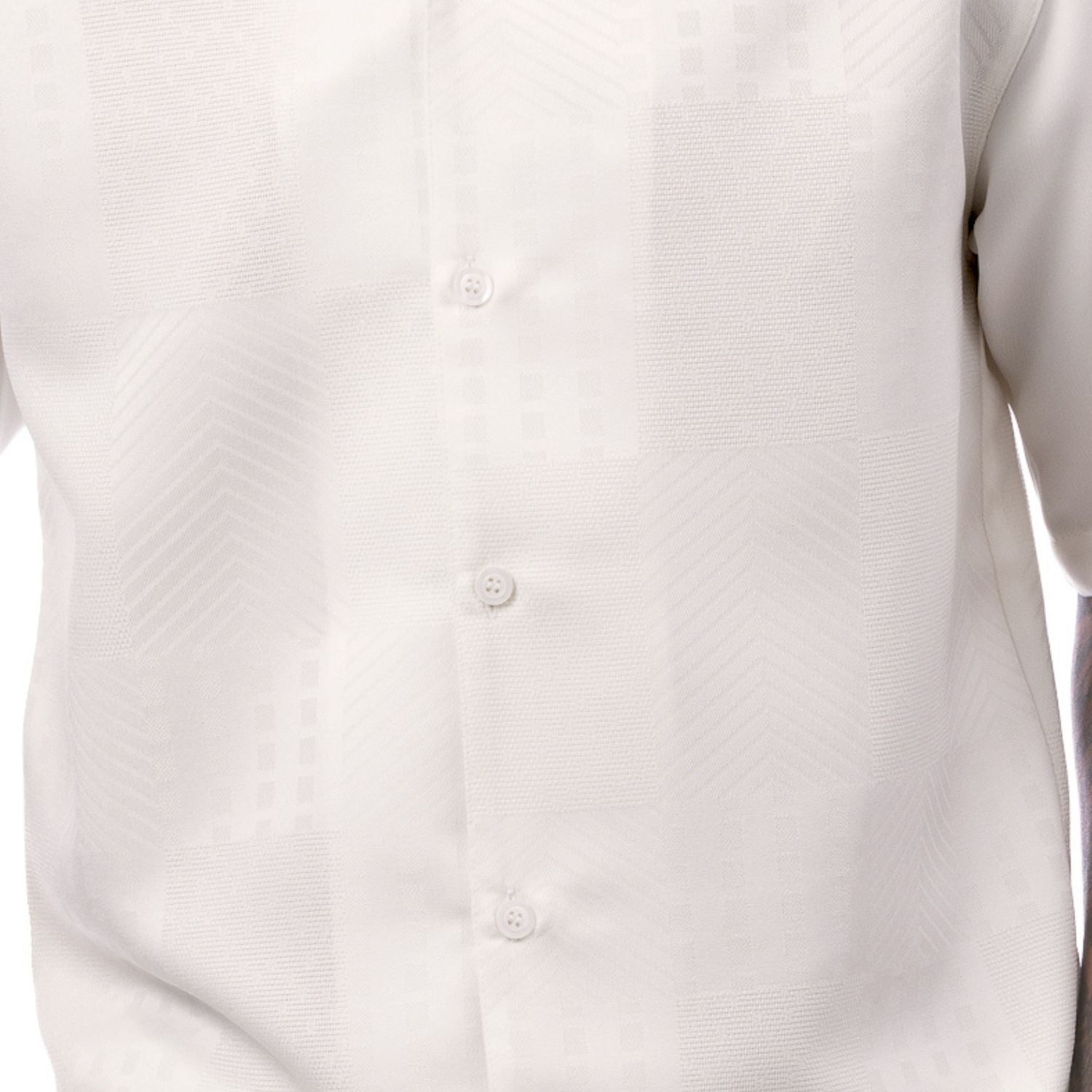 Close-up of the cream shirt showing the detailed tonal jacquard panel weave and textured pattern.