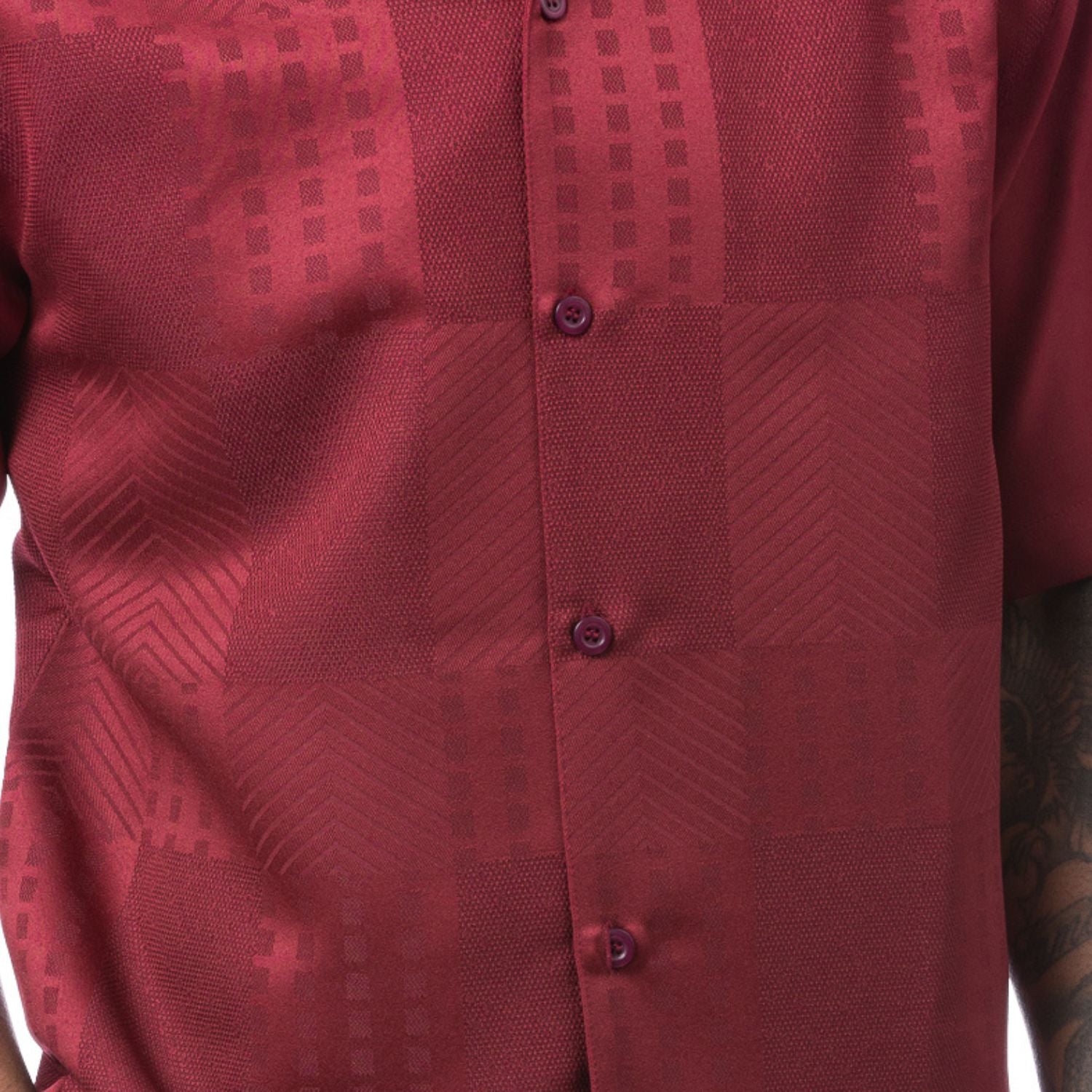 Close-up of the burgundy shirt showing the detailed tonal jacquard panel weave and textured pattern.