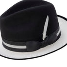 Black wool felt fedora hat by Montique with contrasting white brim