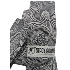 Close-up of Stacy Adams black and white paisley tie and pocket square set