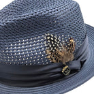 slate hat close-up with open woven crown, matching brim, and side feather detail and logo pin