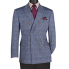 Close-up detail of blue windowpane plaid blazer fabric and double-breasted front