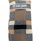 close up of taupe charcoal black and ivory block stripe dress socks