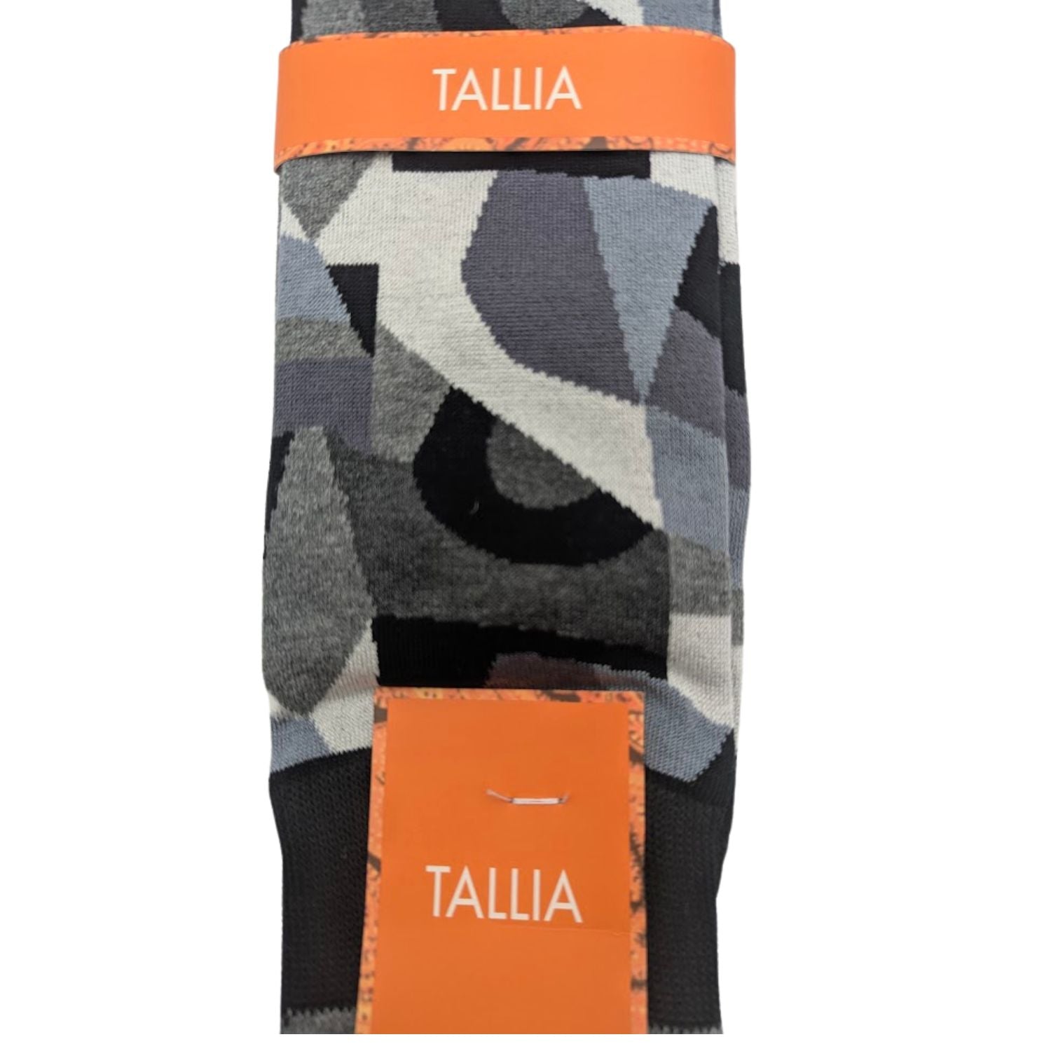 close up of black gray abstract geometric dress sock pattern