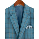 Close-up detail of teal windowpane plaid wool-feel fabric pattern