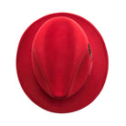 red wool felt fedora hat top view with pinched crown, smooth felt texture, wide brim, and feather detail on the side