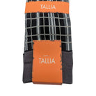 close up of black grey dress socks with grid pattern