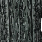Close-up of black wavy textured knit walking suit shorts set fabric detail