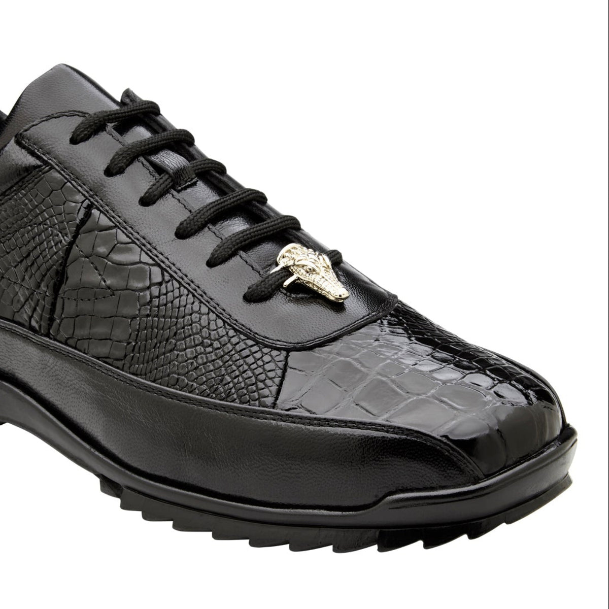 Close side view of black alligator leather sneaker