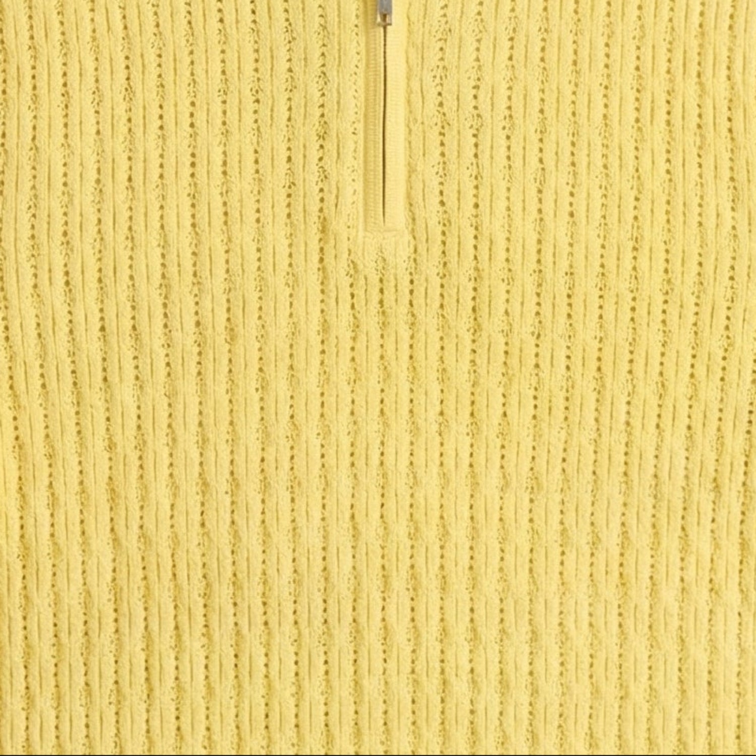 Yellow textured knit zip polo shirt fabric details