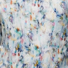 white long sleeve shirt with abstract linen-style print detail